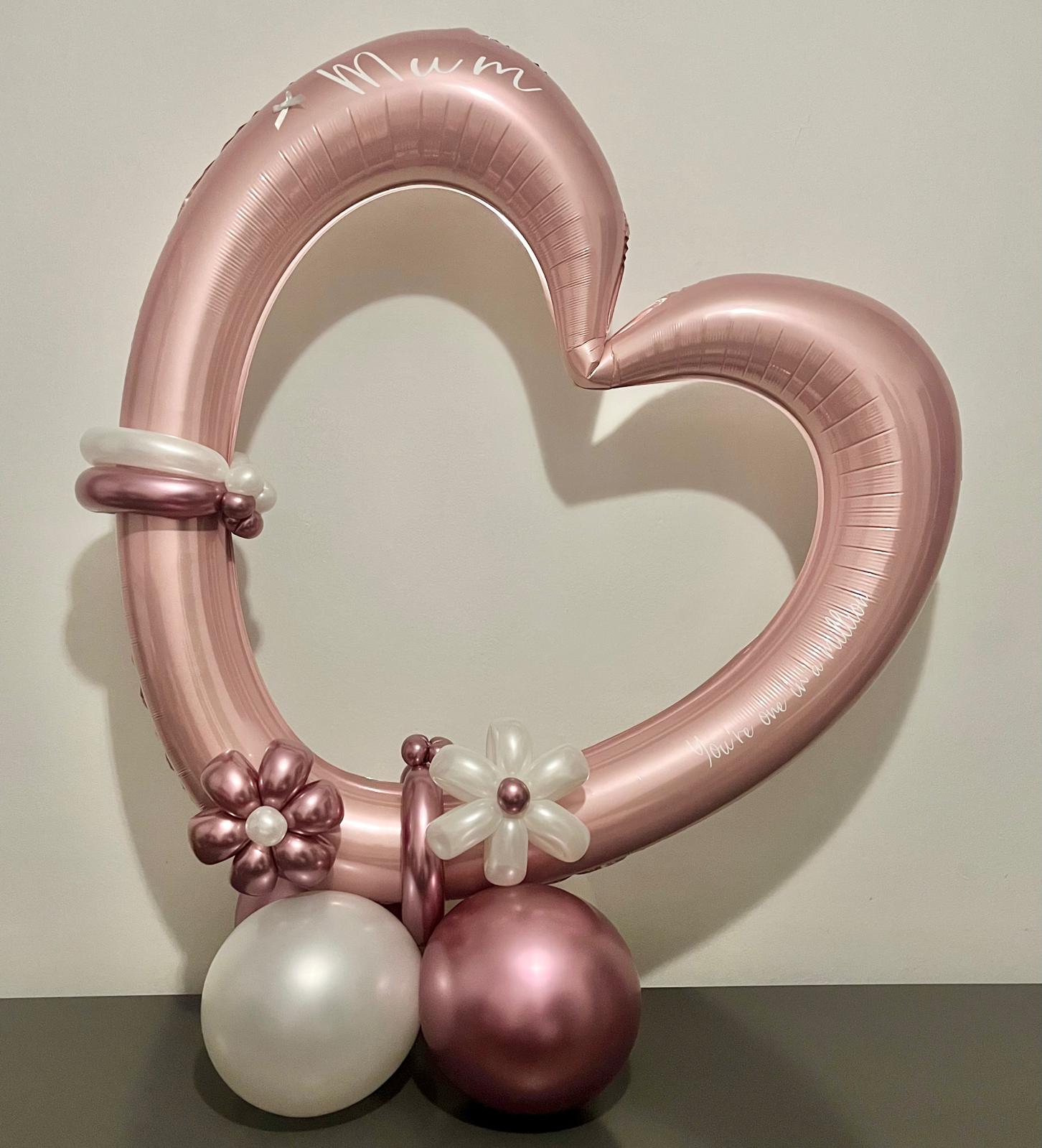 Rose gold balloon heart frame with Mum lettering and balloon flowers for Mother's Day in Newtownards